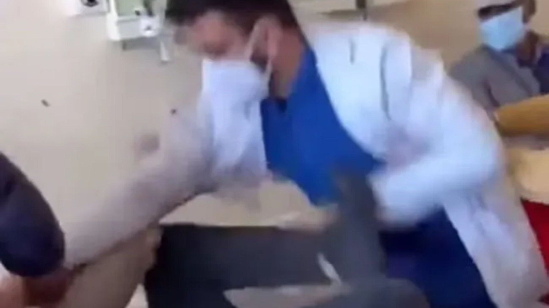Shocking moment doctor repeatedly punches patient lying on bed after victim asked to be spoken to with respect
